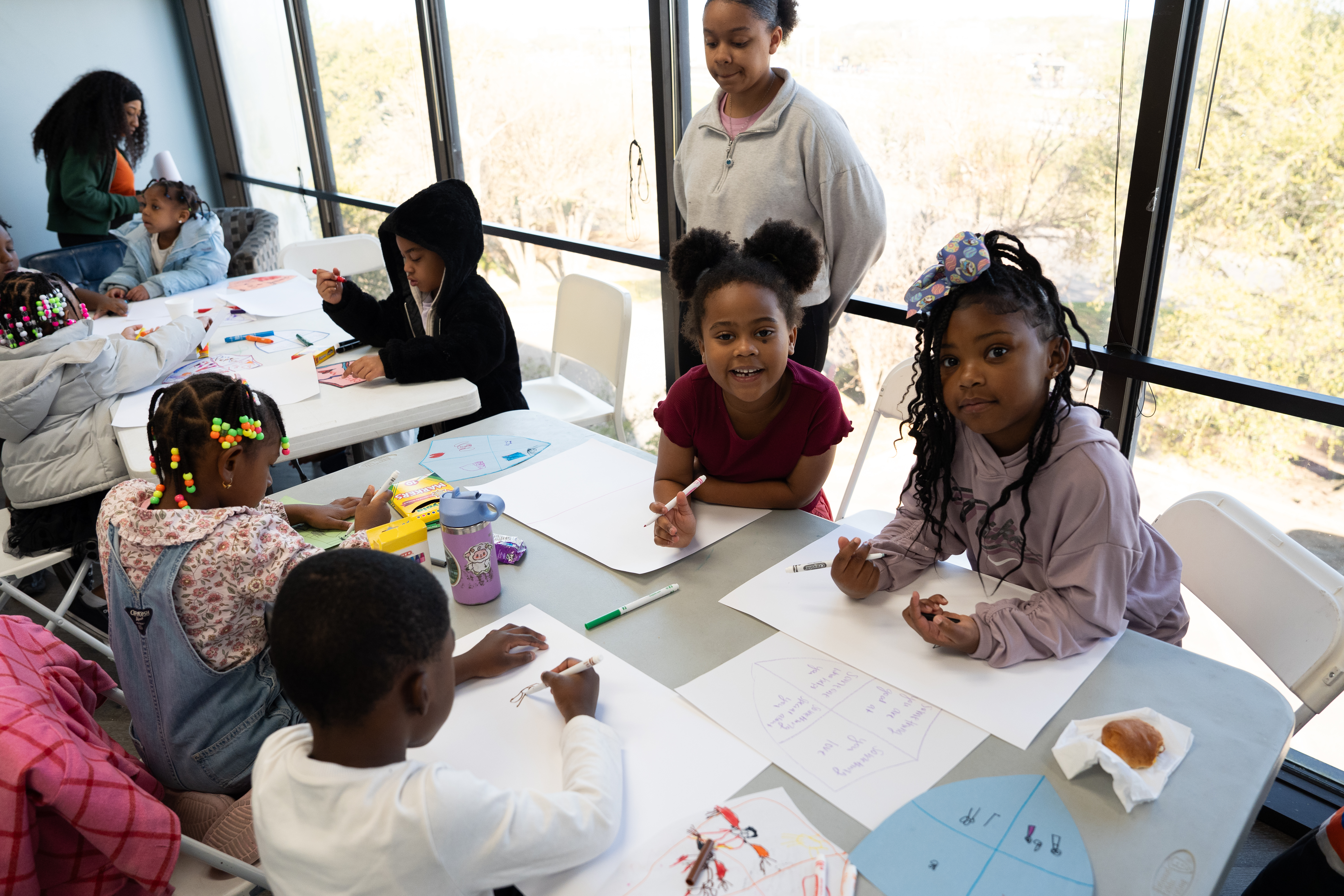 AAYHF youngsters do homework at table