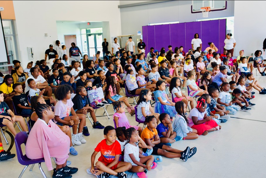 Kids sit on floor spellbound AAYHF