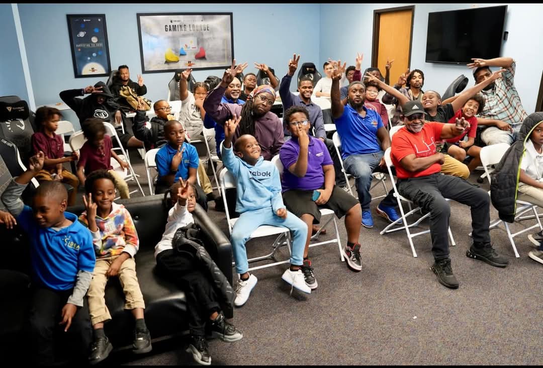 AAYHF group photo raised hands