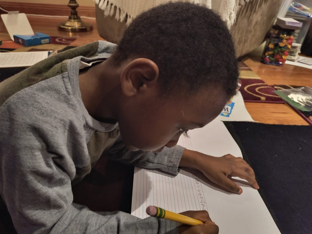 Elementary student developing writing skills during individualized tutoring support